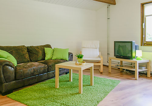 Woonkamer van Chalet Clausheide